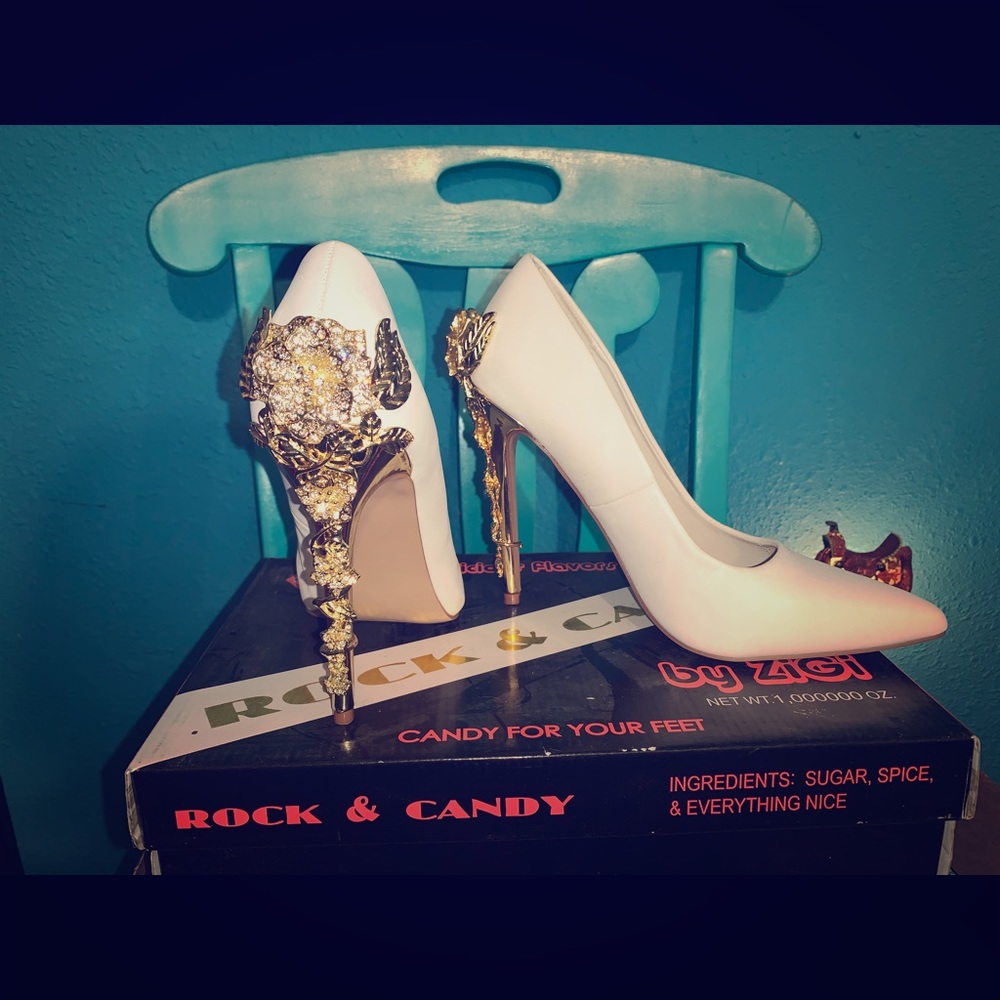 White heels with gold decor on heel